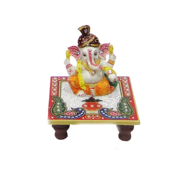 Marble Crafted Lord Ganesh Statue Sitting On Chowki